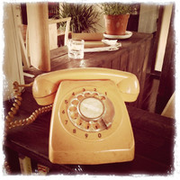 An Old Yellow Telephone