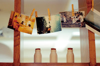 Picture Wall and Three Bottles